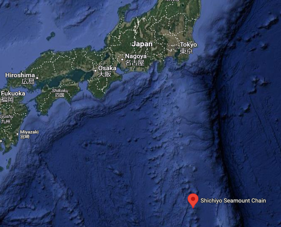 A satellite map view of southern Japan and the surrounding Pacific Ocean, with a red marker indicating the Shichiyo Seamount Chain. This location served as the dive site for a recent deep-sea expedition focused on exploring undersea biodiversity and geological features.